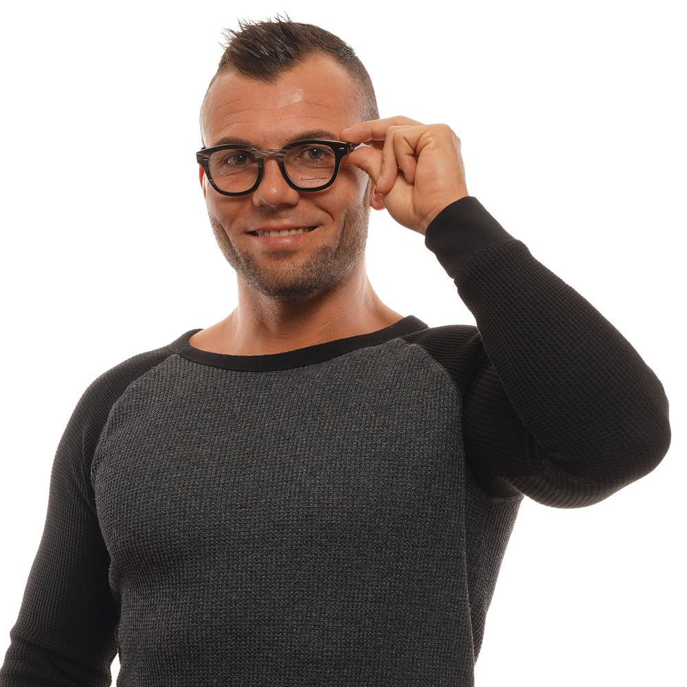 Man wearing Ermenegildo Zegna Black Horn Glasses (Frames), full-rim square style, in black horn material. Fashion eyewear for men.