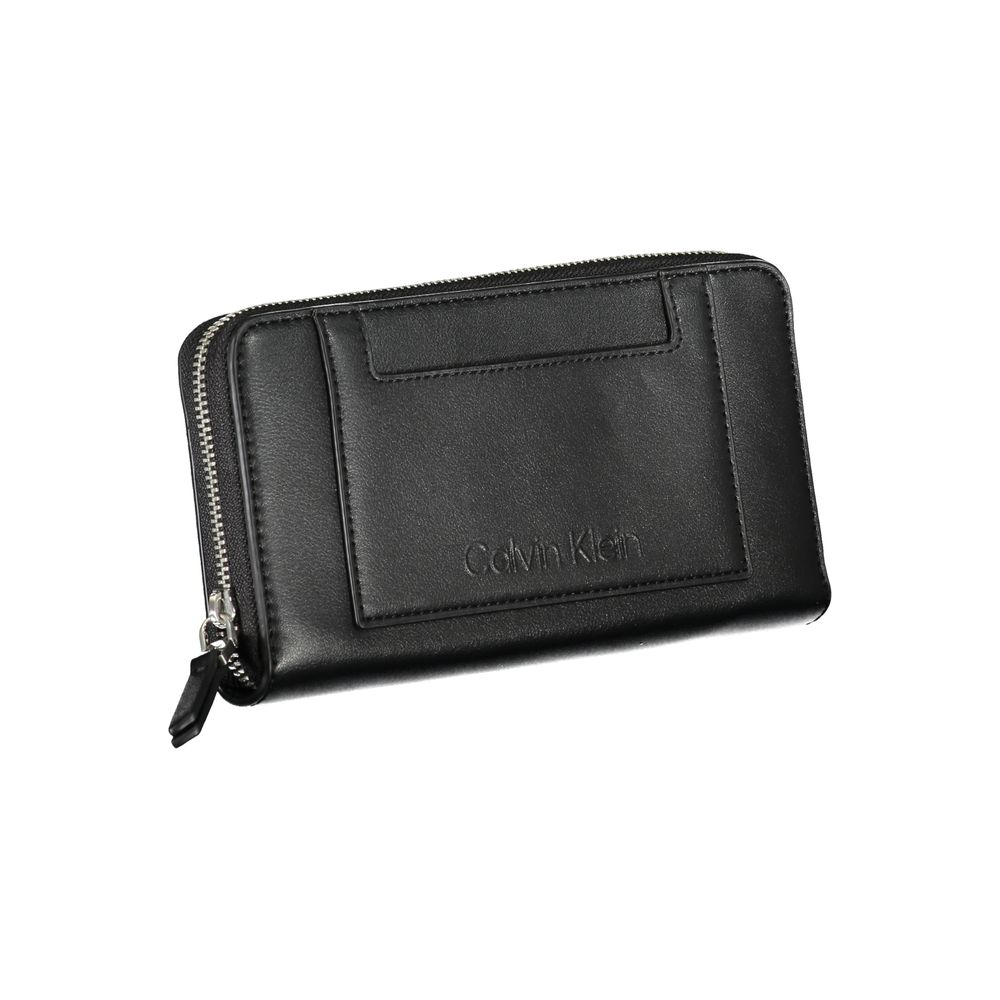 Calvin Klein Black Polyester Wallet with 5 compartments, card spaces, coin purse, external pocket, zip closure, contrasting details.