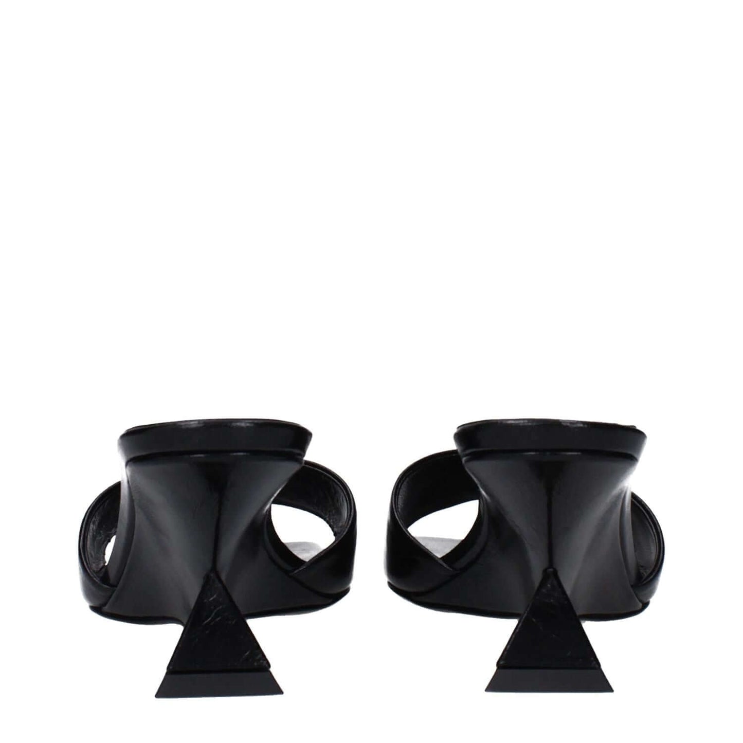 The Attico Black Leather Flat Sandals with vintage and aged effects, back view showcasing unique triangular heels.