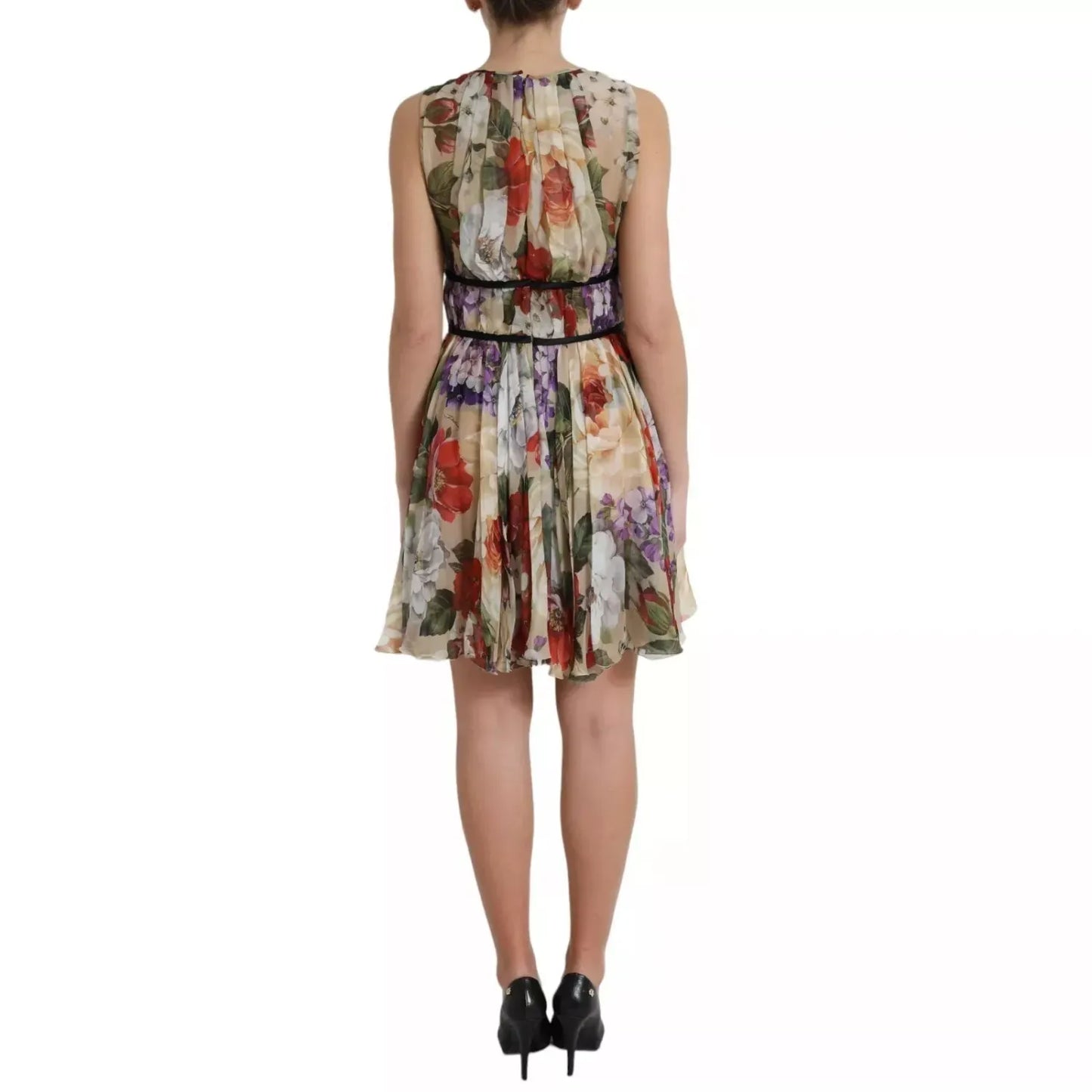 Back view of Dolce & Gabbana Beige Floral Sleeveless A-line Mini Dress worn by model.