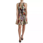 Dolce & Gabbana Beige Floral Sleeveless A-line Mini Dress in lightweight silk with delicate floral print for elegant daytime or special occasions.