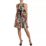 Dolce & Gabbana Beige Floral Sleeveless A-line Mini Dress, elegant silk attire with floral print for versatile day or evening wear.