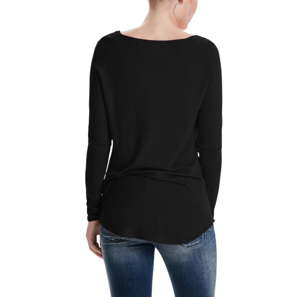 Back view of model wearing Only Black Viscose Sweatshirt showcasing its long sleeves and asymmetric cut.