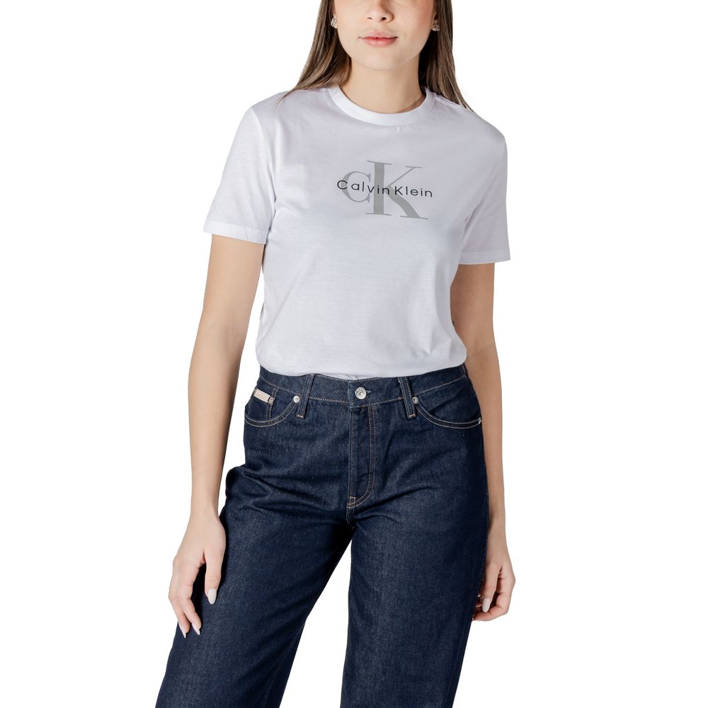 Calvin Klein Jeans White Cotton T-Shirt with iconic logo, perfect for casual elegance and comfort, paired with blue jeans.