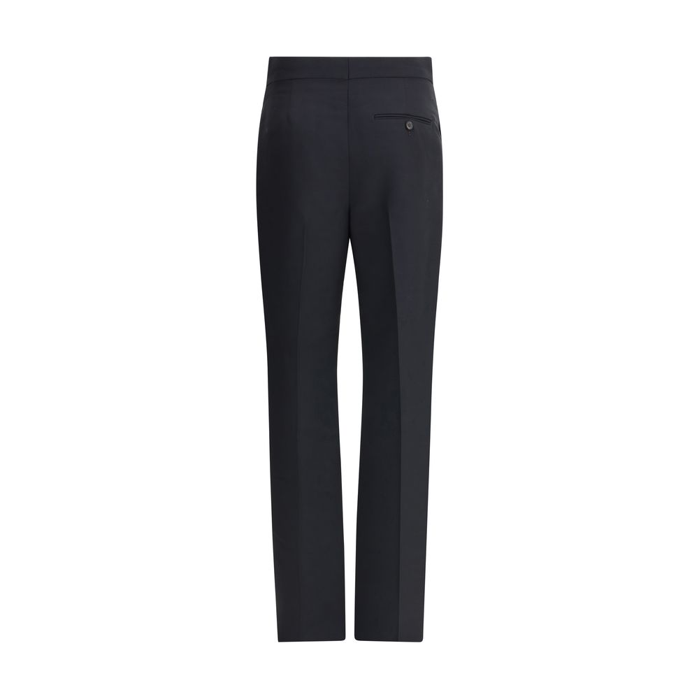 Ferragamo Tailored Pants with back welt pockets showcasing minimalist style and elegant craftsmanship for AW25 collection.
