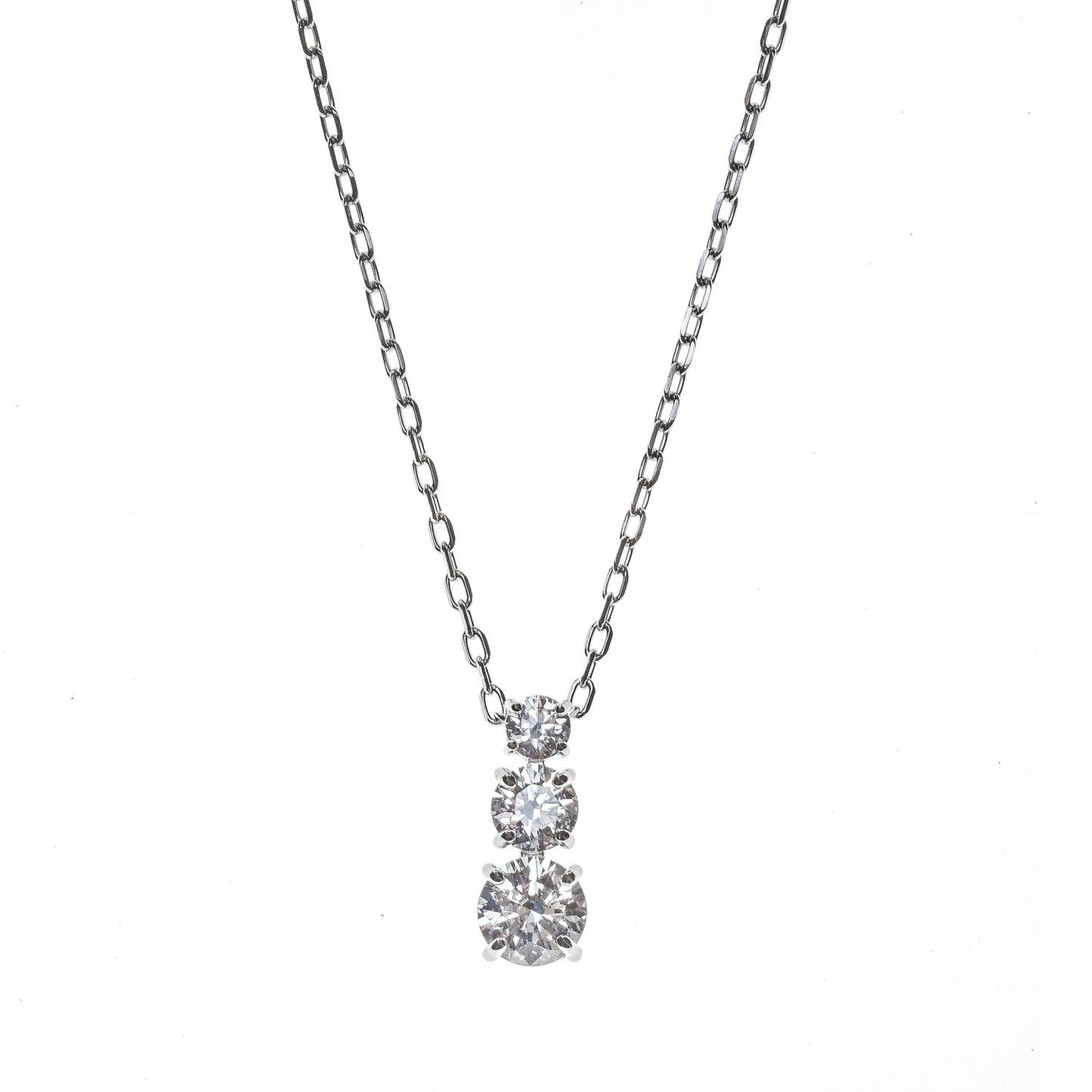 SWAROVSKI Mod. 5414970 pendant necklace with round cut stones, symbolizing eternal love, part of the Attract Trilogy collection.