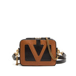 Valentino Garavani Viva Superstar leather camera bag with chain-link shoulder strap and internal card slots, black and brown