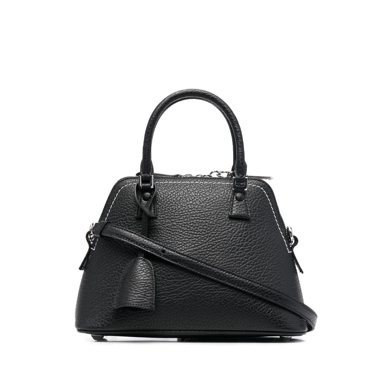 Front view with bag zipped and handles upright.