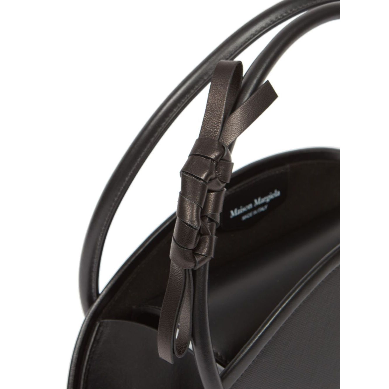 Front view with bag zipped and handles upright.