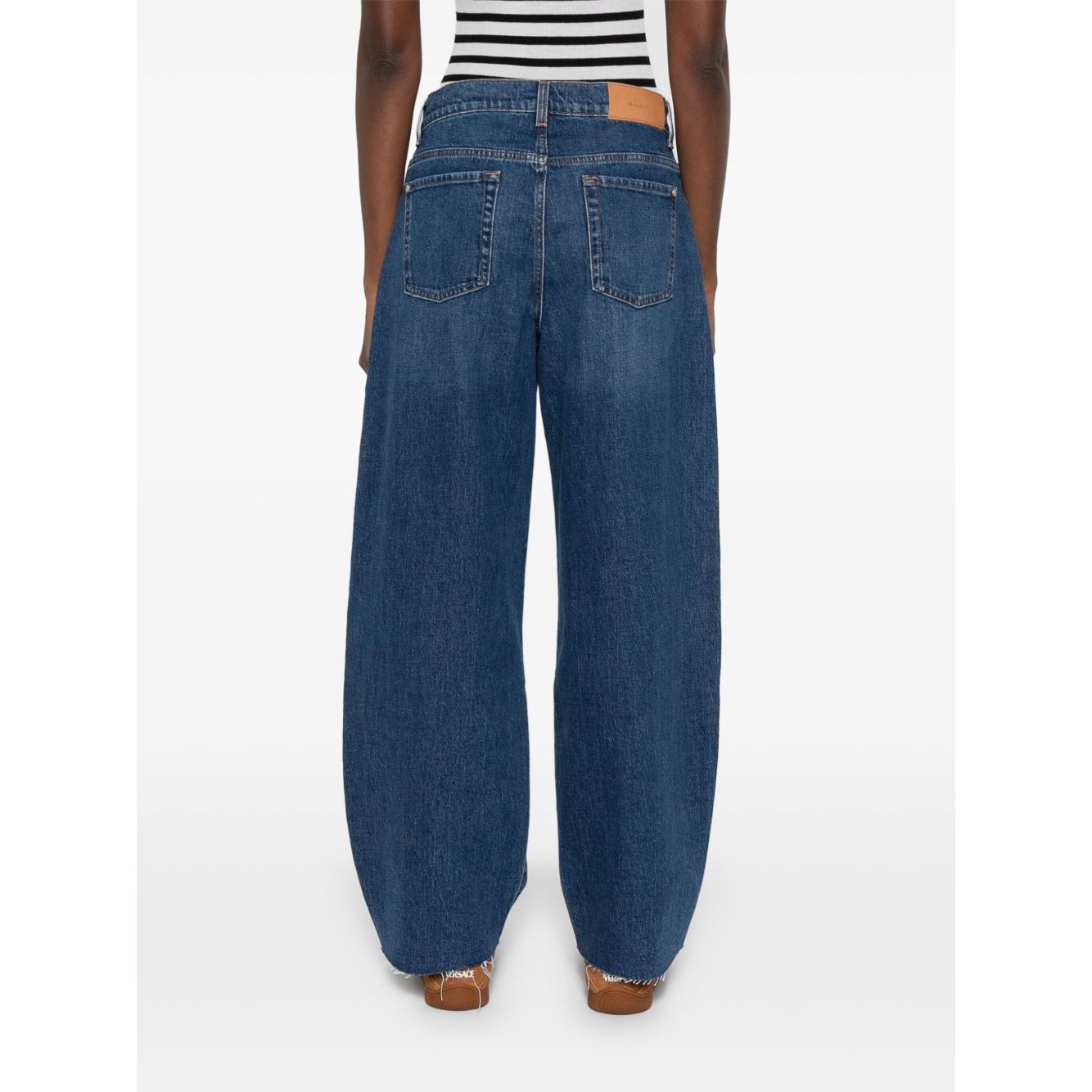 Back view of Seven Jeans Blue baggy denim with classic five pockets and whiskering effect on thighs.