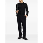 Paul Smith T-shirts and Polos Black, long-sleeved wool polo shirt with front button fastening, ribbed cuffs and hem.