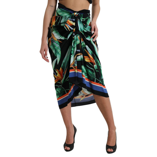 Dolce & Gabbana Black Strelitzia High Waist Wrap Midi Skirt with floral pattern, worn by model, showing vibrant multicolor design.
