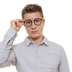 Man wearing Police Brown Men Glasses Frame with a full-rim design, metal and plastic material, and aviator style.