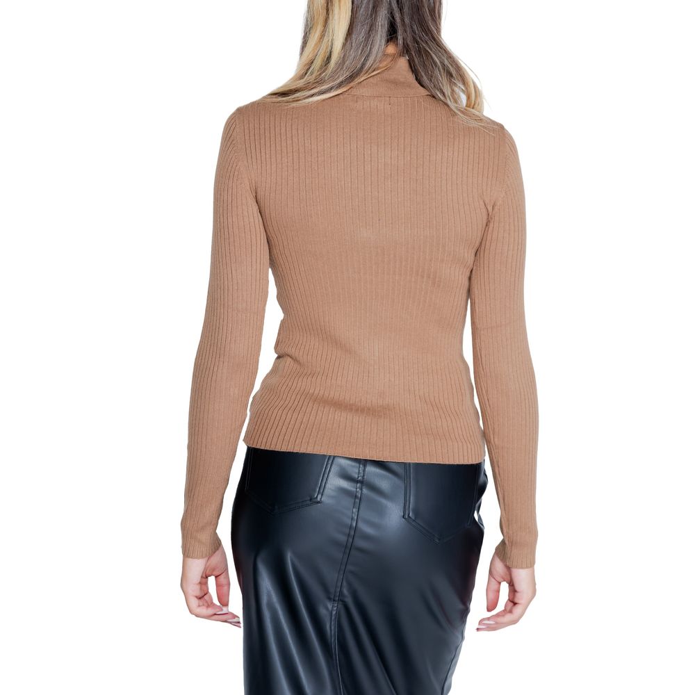 Back view of woman wearing Jacqueline De Yong Brown Viscose Sweatshirt with roll neck and long sleeves.