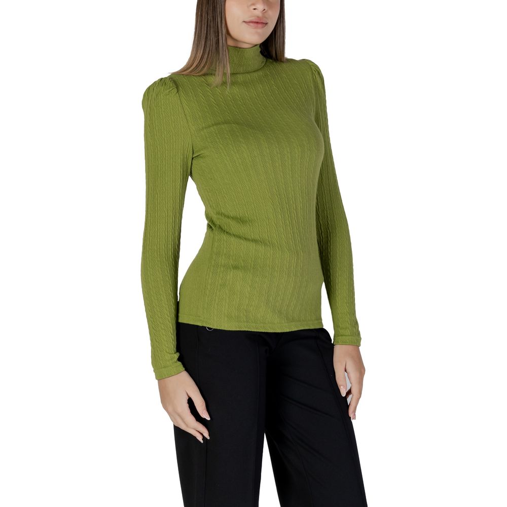 Woman wearing B.Young Green Polyester Long Sleeve T-Shirt with ribbed texture and high neck, enhancing silhouette with structured shoulders.