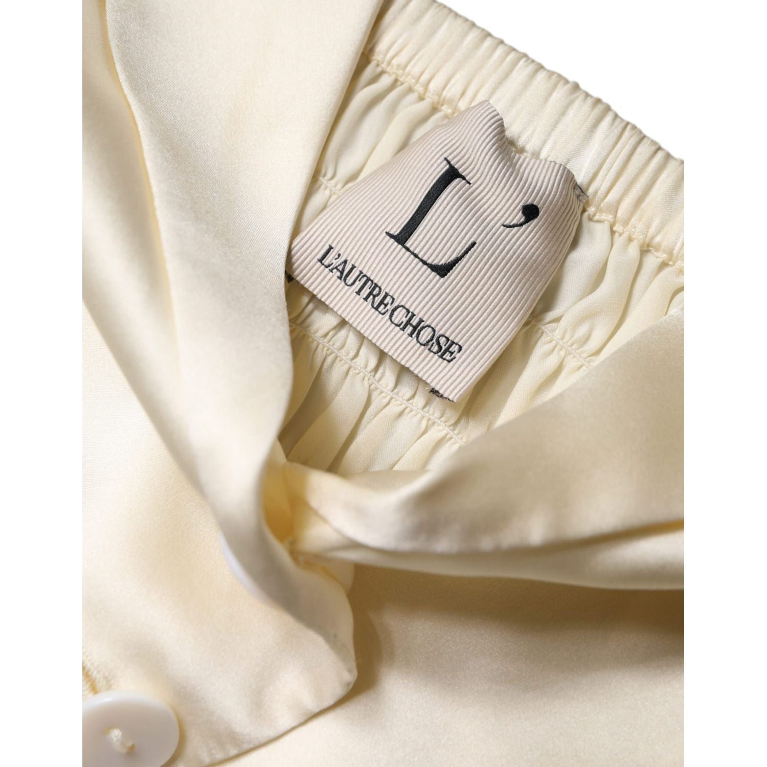 L'Autre Chose Off White Silk Sleeveless Buttoned Halter Top