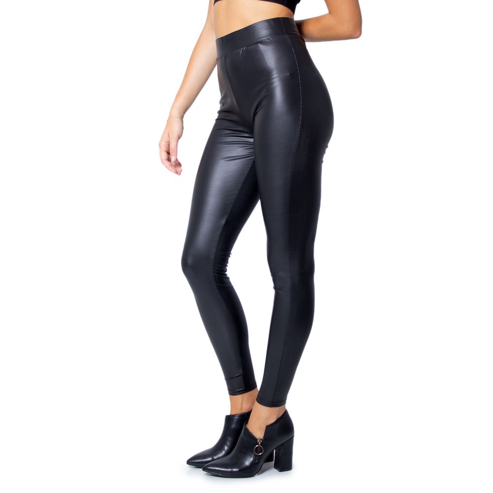 Woman wearing Only Black Polyester Leggings with a glossy finish, perfect for casual and elegant occasions.