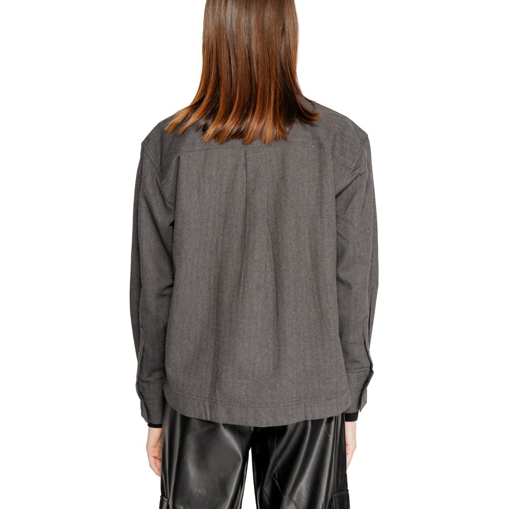 Back view of Jacqueline De Yong Black Recycled Cotton Blouse highlighting relaxed fit and eco-friendly materials.