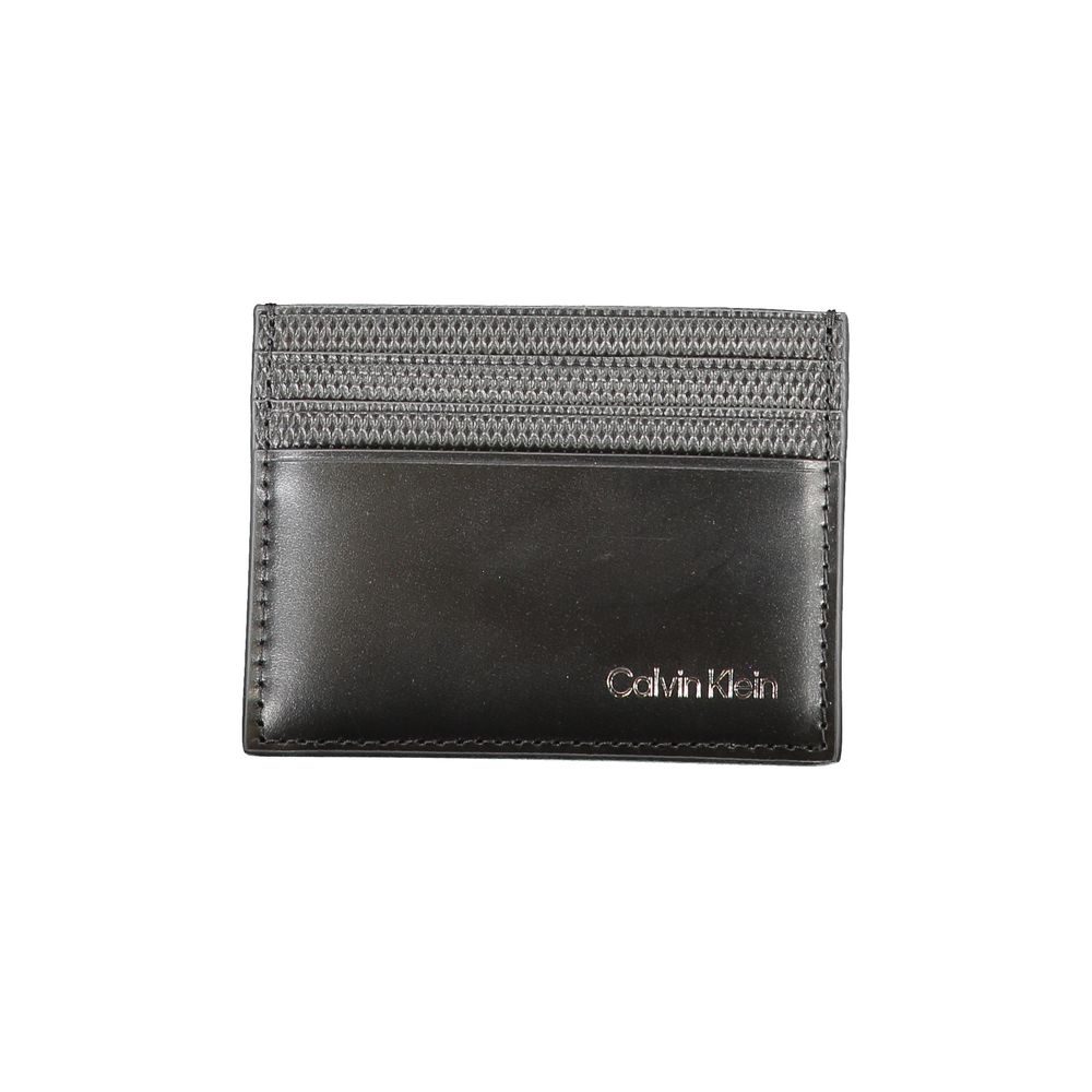 Calvin Klein Black Leather Wallet with card holder, 1 central pocket, contrast details, and logo print, sleek and stylish.