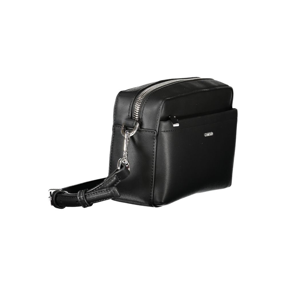 Front view with bag zipped and handles upright.