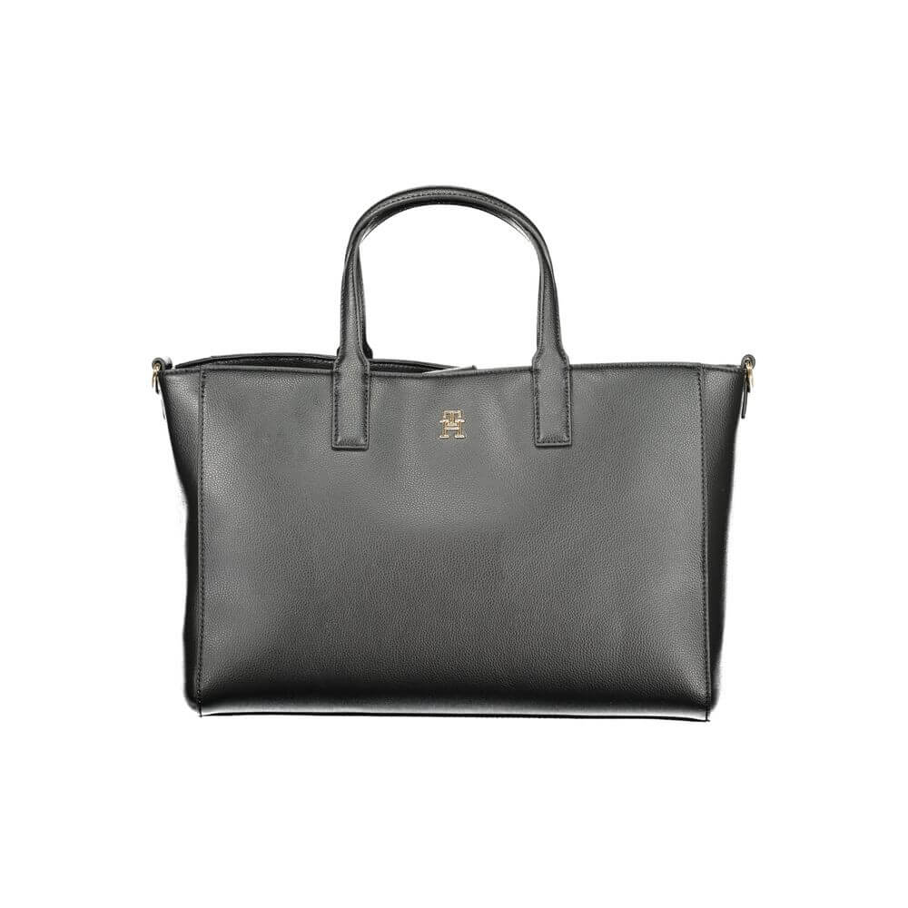 Front view with bag zipped and handles upright.