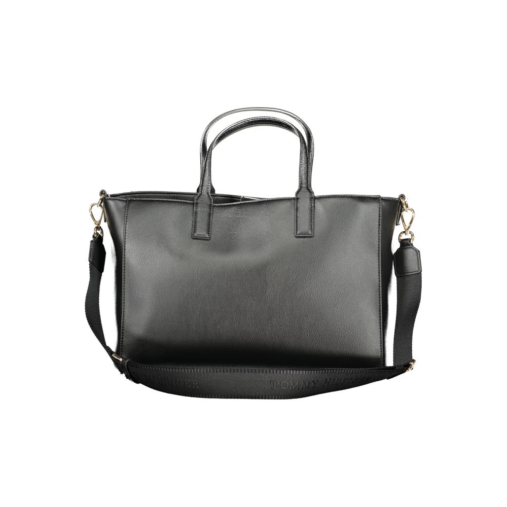 Front view with bag zipped and handles upright.