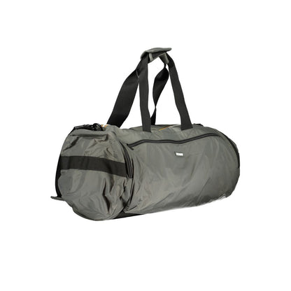 K-WAY Green Polyamide Luggage And Travel bag with shoulder handles, adjustable strap, pockets, and zip closure.