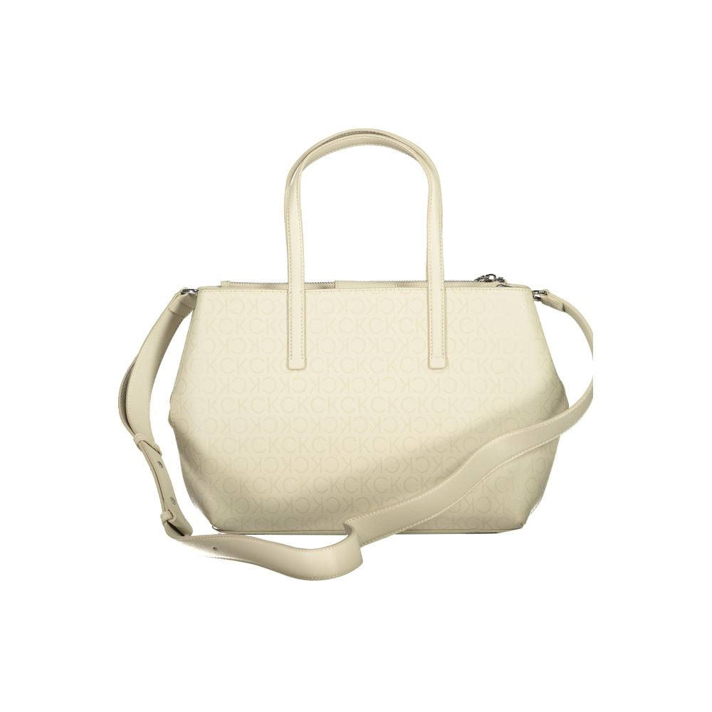 Calvin Klein Beige Polyester Handbag with two handles, adjustable strap, one external and internal pocket, contrasting details.