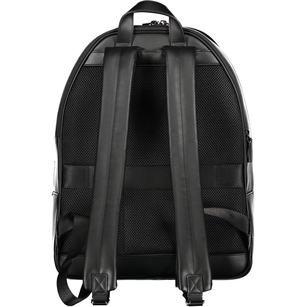 Rear view of Tommy Hilfiger Black Polyester Backpack with adjustable straps and handle, featuring laptop compartment and logo.