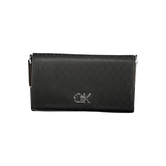 Calvin Klein Black Polyester Women Handbag with elegant silver logo and chic design, perfect for style and functionality.