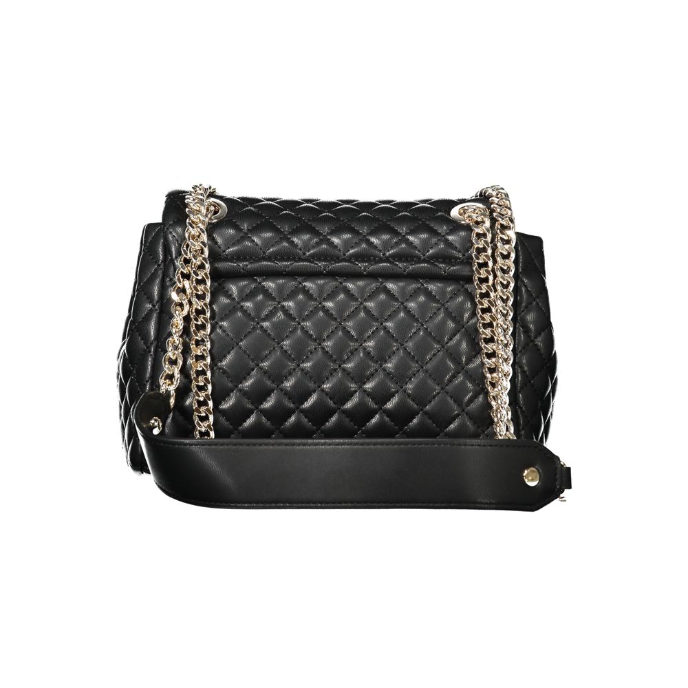 Front view with bag zipped and handles upright.