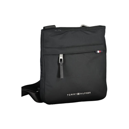 Tommy Hilfiger Black Polyester Shoulder Bag with adjustable strap, zip closure, logo detail, and recycled material.