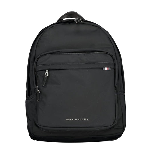 Tommy Hilfiger Black Polyester Backpack with handle, adjustable straps, two external pockets, laptop compartment, and zip closure.
