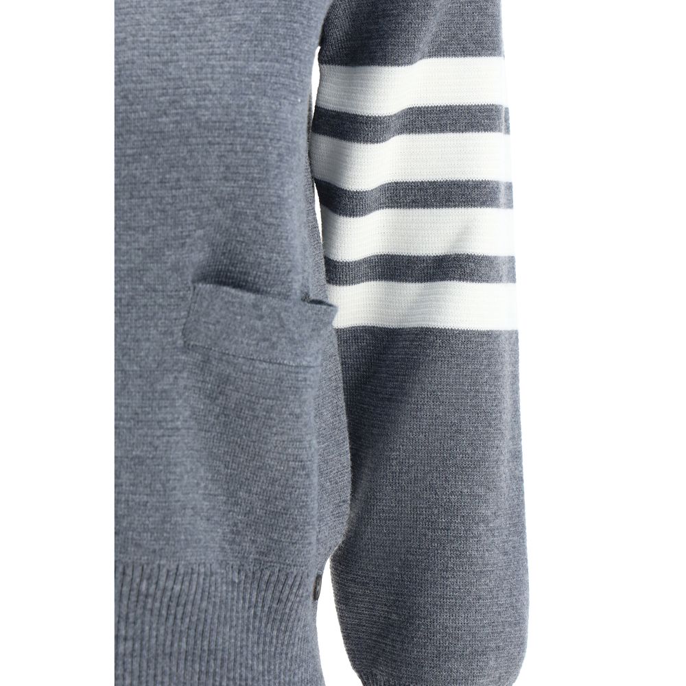 Sleeve detail of Thom Browne Gray Fleece Wool Cardigan with iconic striped bands and open front pocket, made in Italy.
