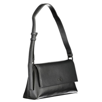 Calvin Klein Black Polyester Handbag with adjustable shoulder handle, internal pocket, snap closure, and logo detailing.