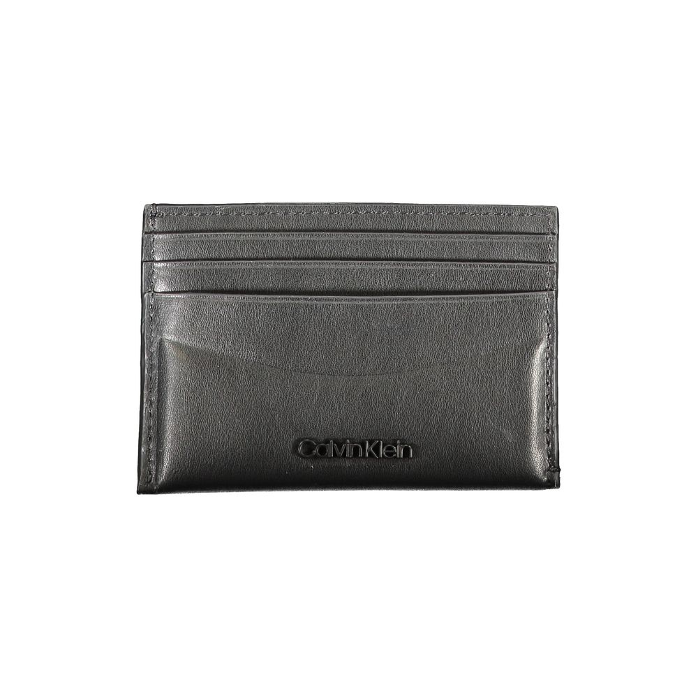 Calvin Klein Black Leather Wallet with card holder, double card spaces, central pocket, contrast details, and logo.