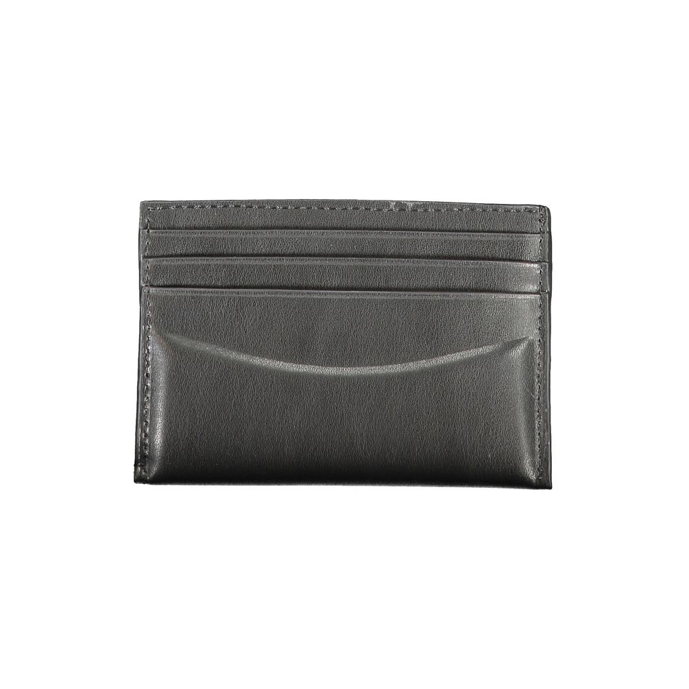 Calvin Klein Black Leather Wallet with card holder, double spaces, central pocket and logo.