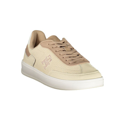 Tommy Hilfiger Beige Leather Women Sneaker with iconic logo embroidery, showcasing a chic and versatile streetwear style.