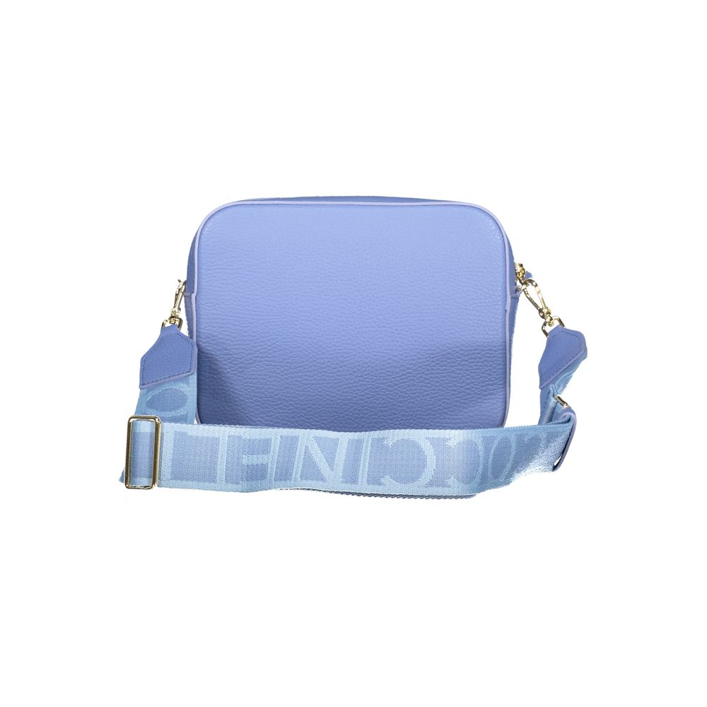 Coccinelle Light Blue Leather Women Handbag with adjustable removable shoulder strap and signature logo.