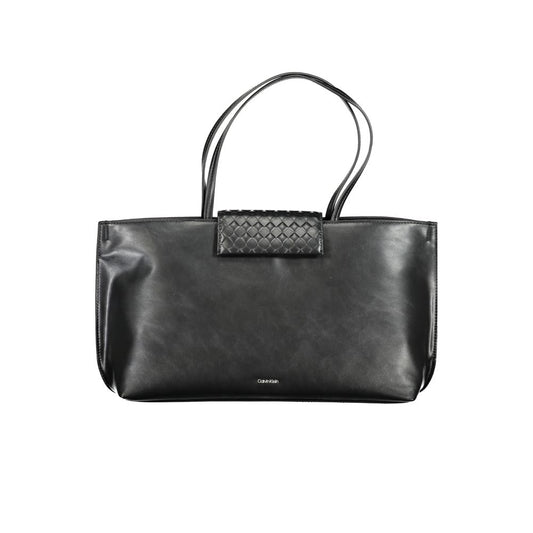 Calvin Klein Black Polyester Handbag with two shoulder handles, internal pocket, contrast details, and magnet closure.