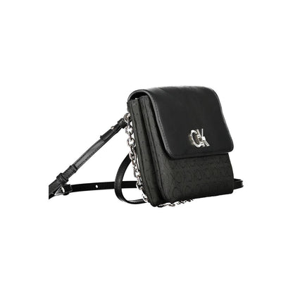 Calvin Klein Black Polyester Handbag with chain handle, adjustable strap, and logo.