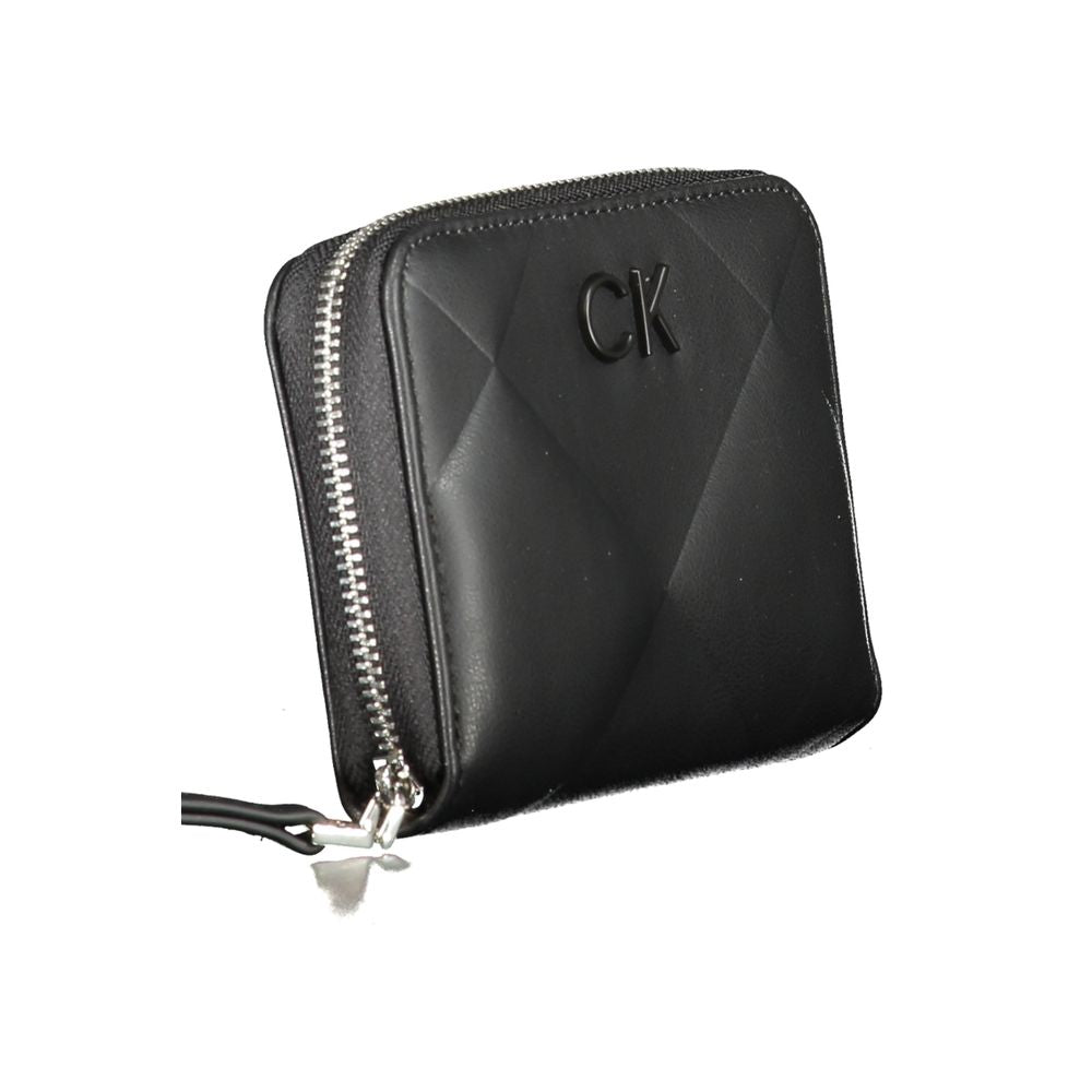 Calvin Klein Black Polyester Wallet with RFID blocking, card spaces, zip closure, and logo detail. Made with 50% recycled polyester.