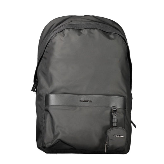 Calvin Klein Black Polyester Backpack with adjustable straps, external pocket, removable coin purse, internal laptop spaces.