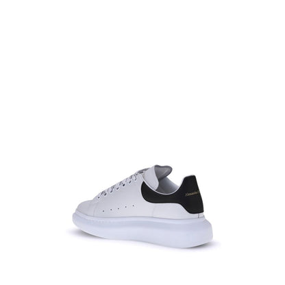 Alexander McQueen White Calf Leather Bos Taurus Platform Sneakers with black heel label and platform sole.