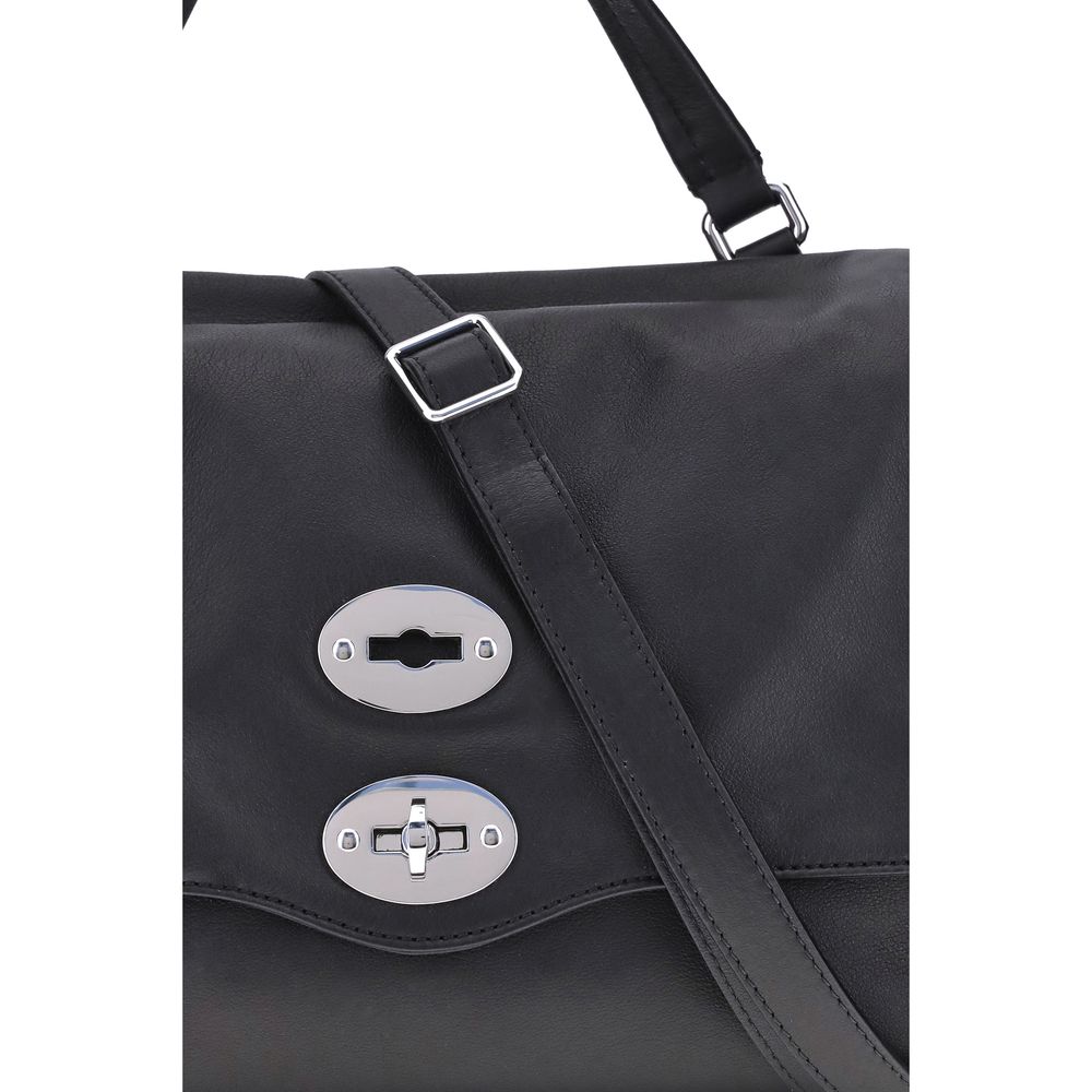 Front view with bag zipped and handles upright.