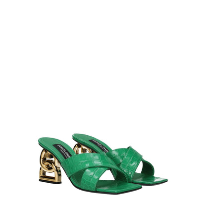 Dolce & Gabbana Green Leather Flat Sandals with gold heel, open toe, and side logo. Stylish and casual footwear for women.