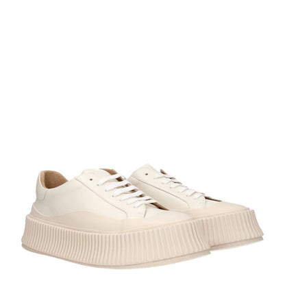 Jil Sander Beige Leather Platform Sneakers with lace-up closure and wedge heel, featuring a round toe and rubber sole, MPN: JS32108A15011101.