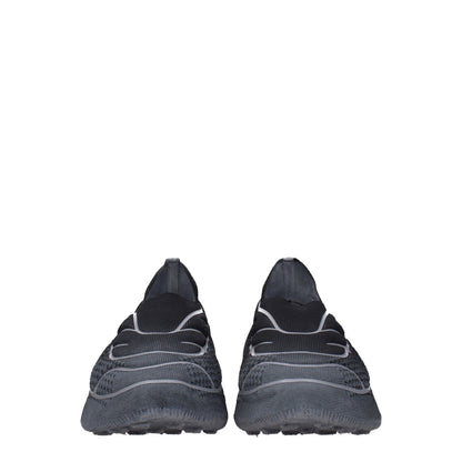 Front view of Givenchy Gray Fabric Athletic Sneakers with logo detail, featuring rubber sole, round toe, and mid heels.