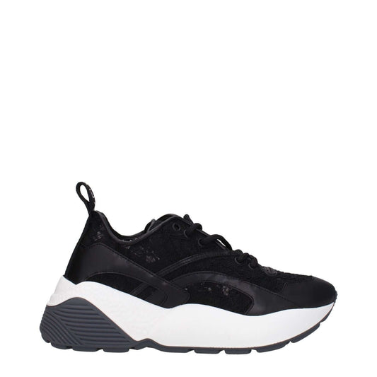 Stella McCartney Black Fabric Chunky Sneakers with lace-up closure, round toe, mid heels, and rubber sole.