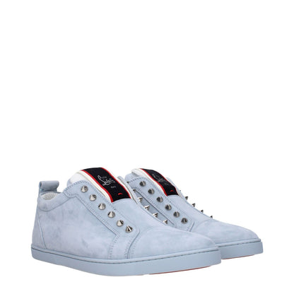 Christian Louboutin Blue Leather Slip-On Loafers with studs and logo detail, featuring a low flat heel and rubber sole.